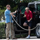 Republican Senator Lindsey Graham gets out of an SUV at the White House in Washington, D.C, on June 16, 2019, after golfing with President Donald Trump at his Trump National Golf Club in Virginia.
